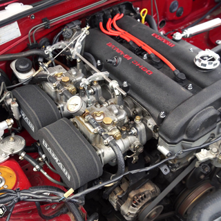 Illustration for article titled We Put Carbs On A Miata, And It Kicked Ass